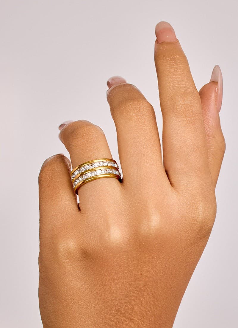 close-up look on 18k gold plated dual crystal band ring by elra