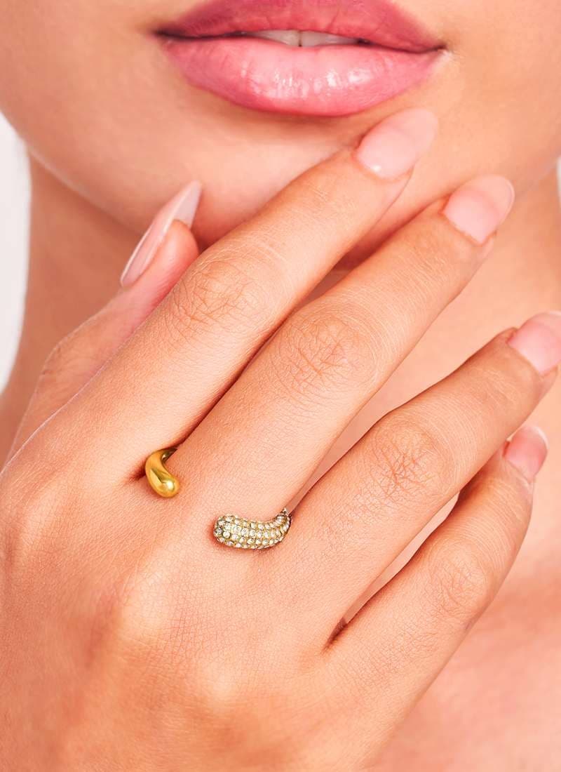 Woman wearing Celestial Glow Ring gold pavé crystal ring