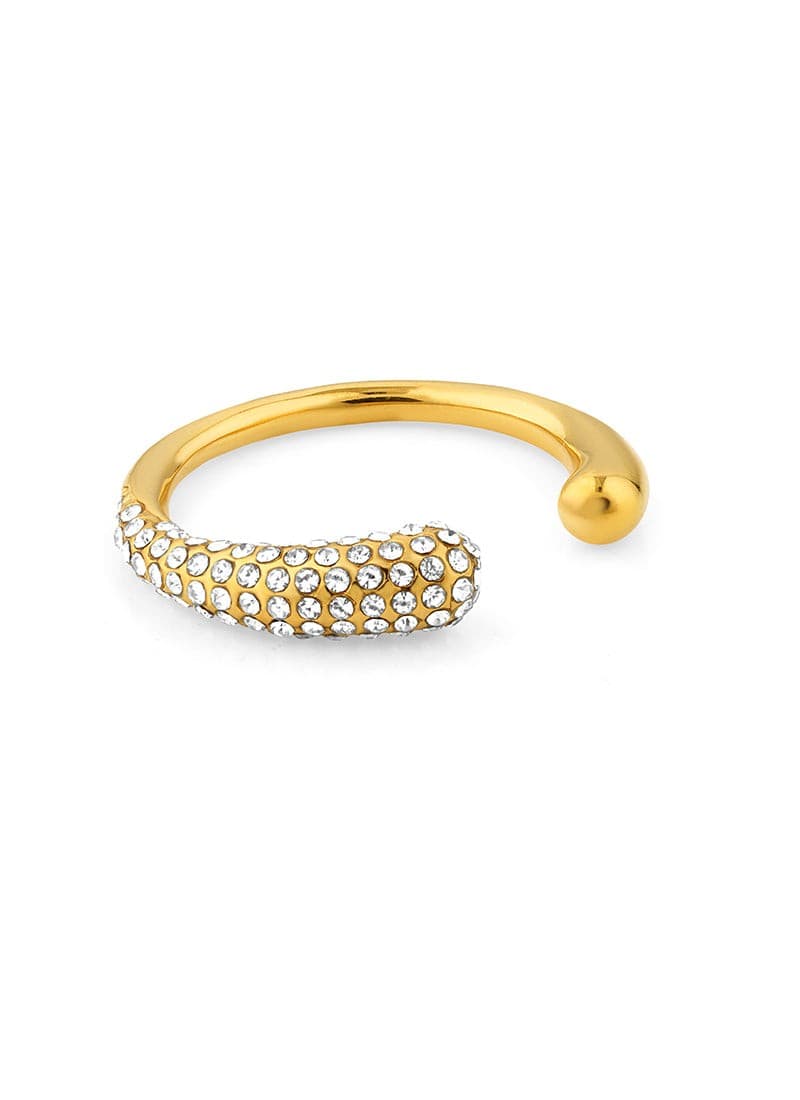 Close-up of pavé crystal gold ring