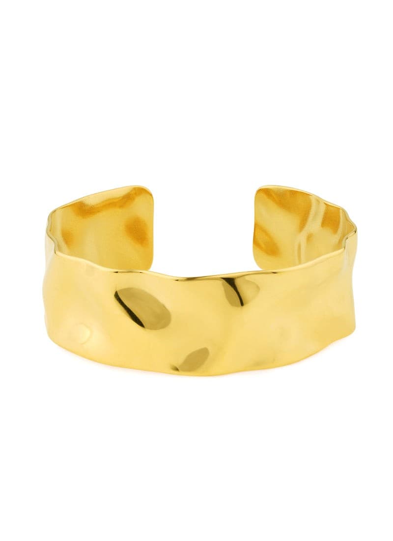 Close-up look at 18k gold-plated golden wave cuff bracelet by elra