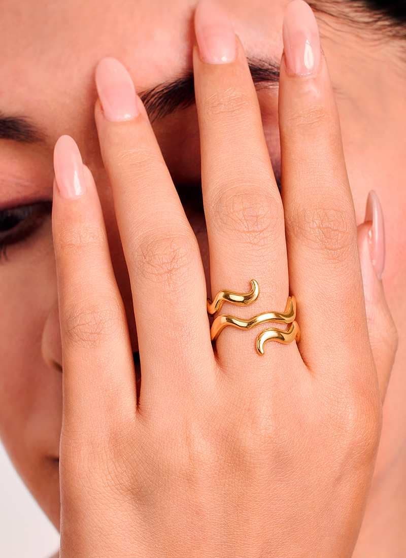 close-up look of serene flow gold-plated ring